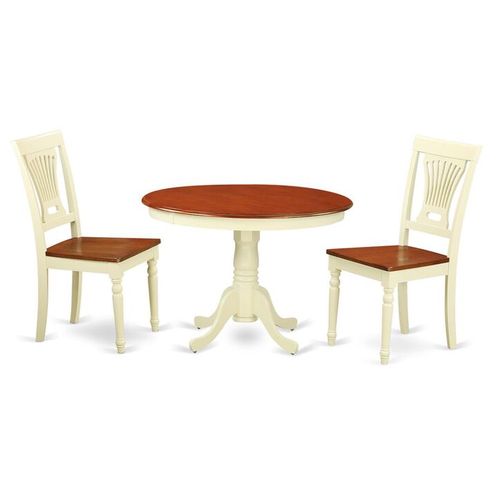 3 Pc set with a Round Dinette Table and 2 Wood Dinette Chairs in Buttermilk and Cherry .