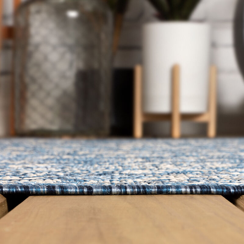 Tela Bohemian Textured Weave Floral Area Rug