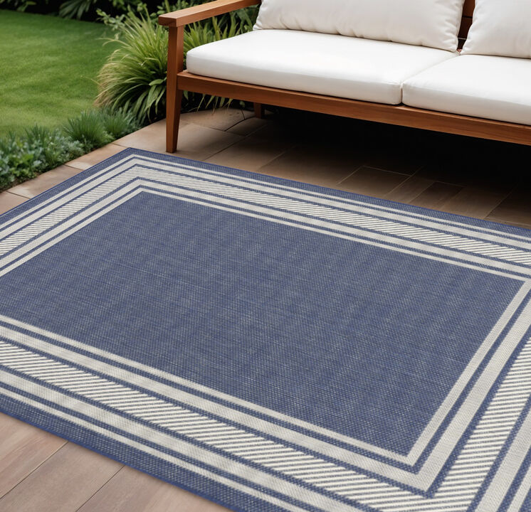 HomeRoots 6' X 9' Navy Blue And Ivory Geometric Indoor Outdoor Area Rug