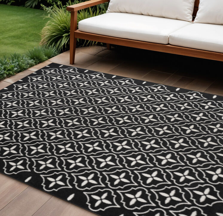 HomeRoots 6' X 9' Black And Ivory Geometric Indoor Outdoor Area Rug