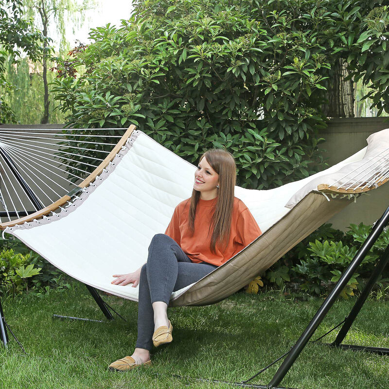 Quilted Hammock with Curved Wicker Spreaders for Comfortable Outdoor Relaxation