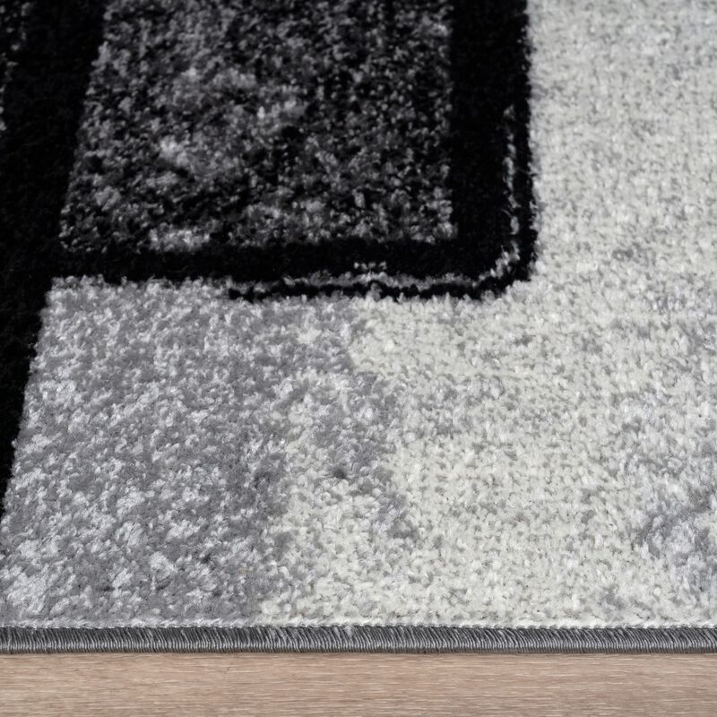 Black-White Area Rug with Modern Abstract Paint Effect