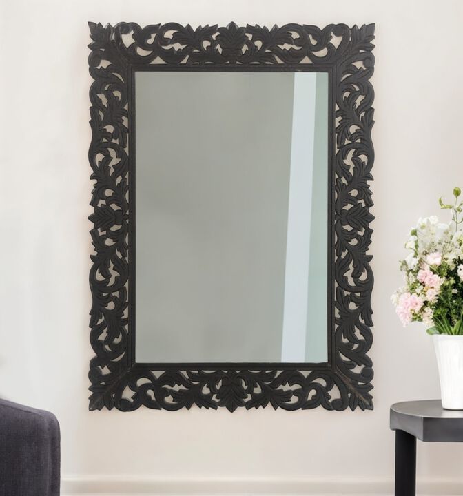 HomeRoots 47" Black  Floral Carved Solid Wood Framed Accent Mirror