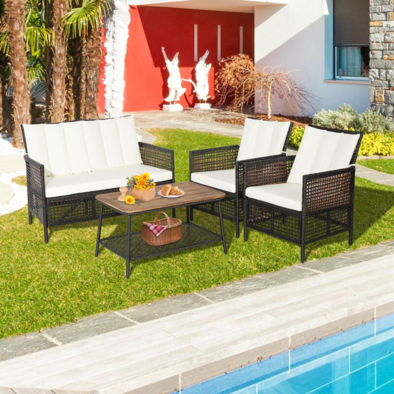 Hivvago 4 Pieces Patio Rattan Furniture Set with 2-Tier Coffee Table