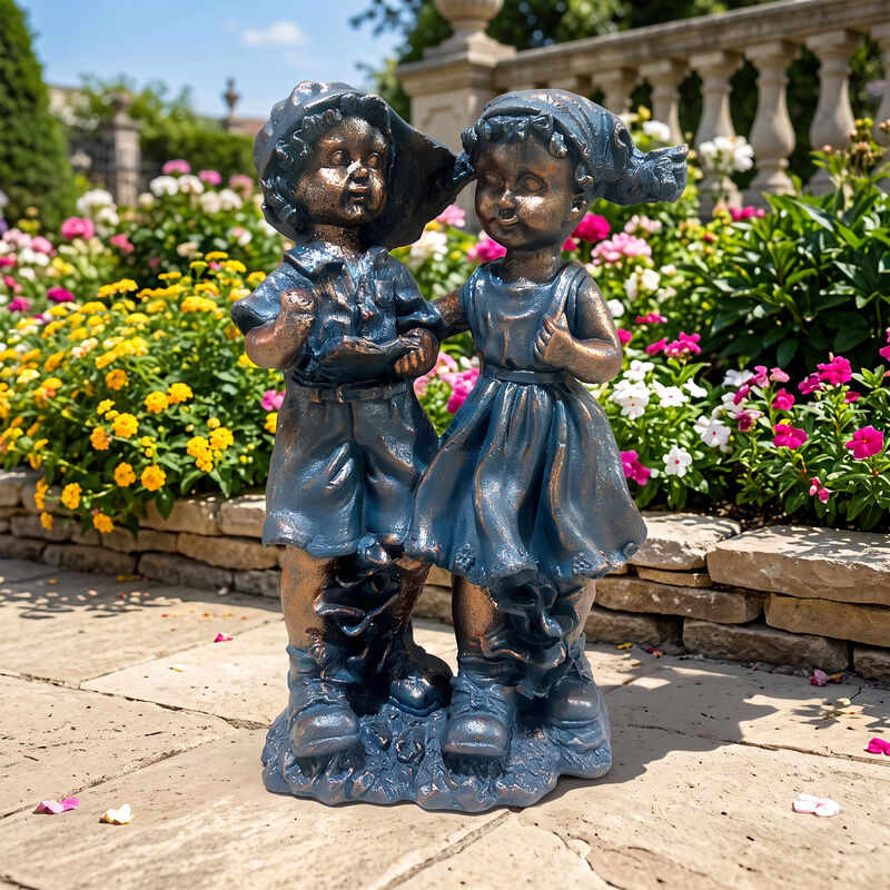 Joxti statues of a boy and a girl image number 2