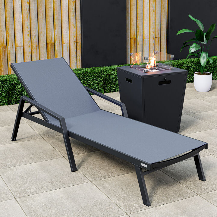 LeisureMod Marlin Black Aluminum Patio Chaise Lounge Chair with Arms & White Fire Pit Table