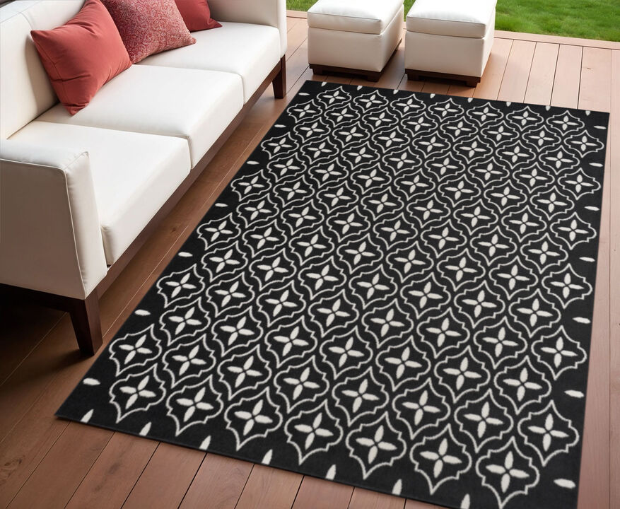 HomeRoots 4' X 6' Black And Ivory Geometric Indoor Outdoor Area Rug