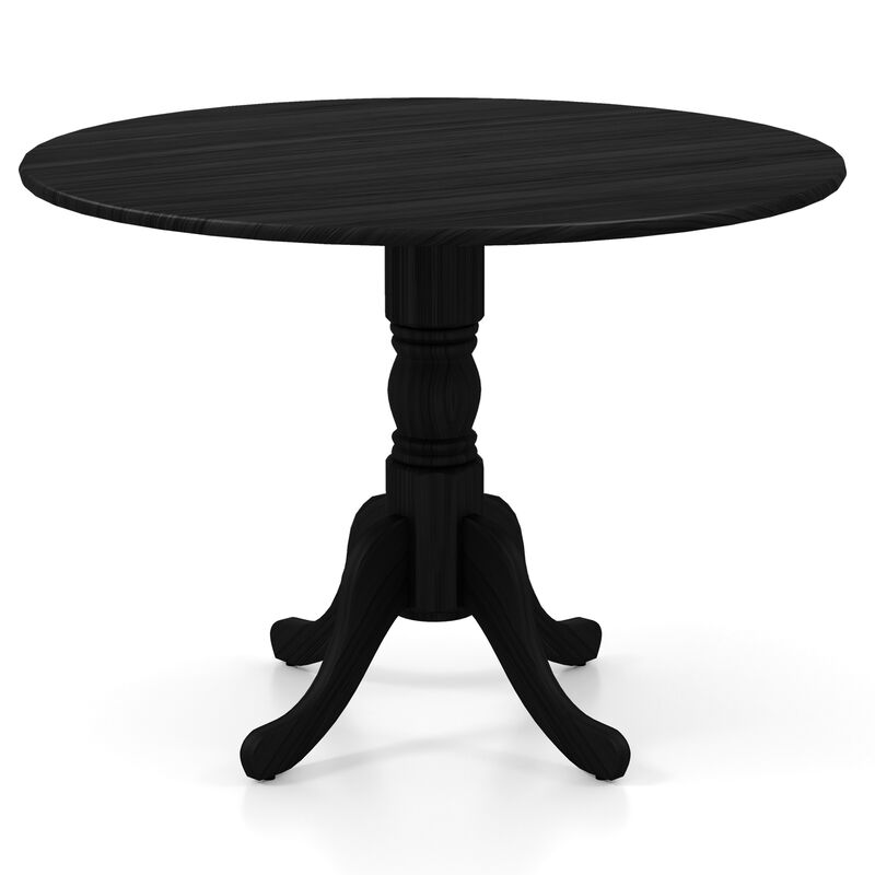 Wooden Dining Table with Round Tabletop and Curved Trestle Legs.