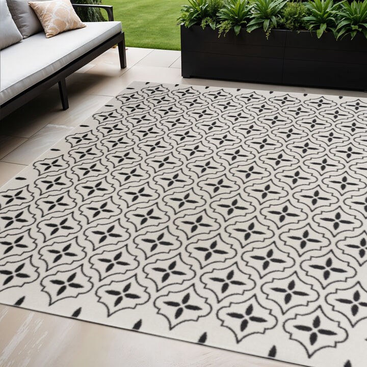 HomeRoots 5' X 7' Ivory And Black Geometric Indoor Outdoor Area Rug