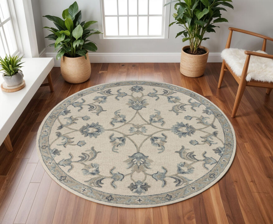 HomeRoots 7' Ivory And Blue Wool Hand Tufted Round Rug