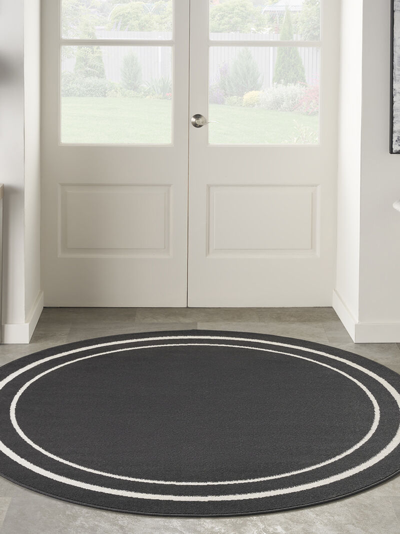 Nourison Essentials NRE02 Black/Ivory 8' x Round Rug