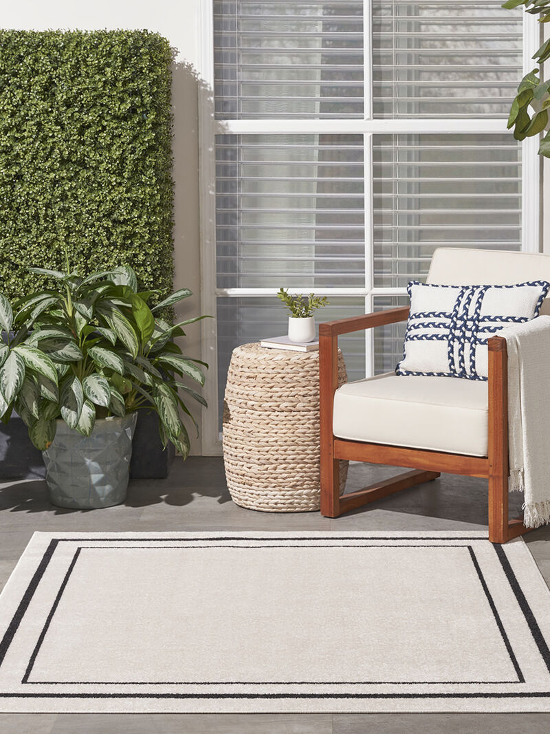 Nourison Essentials NRE02 Ivory/Black 5' x Square Rug