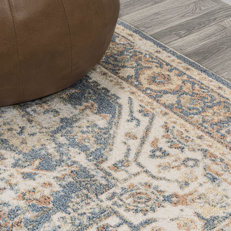 Keesha Bold Distressed Medallion Low-Pile Machine-Washable Blue/Cream. Area Rug