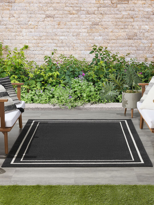 Nourison Essentials NRE02 Black/Ivory 6' x 9' Rug