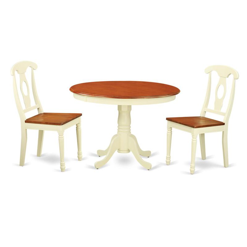 3 Pc set with a Round Kitchen Table and 2 Wood Dinette Chairs in Buttermilk and Cherry .