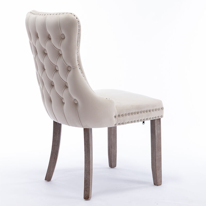 Streamdale 2 Beige Wingback Dining Chairs with Nailhead Trim & Wood Legs