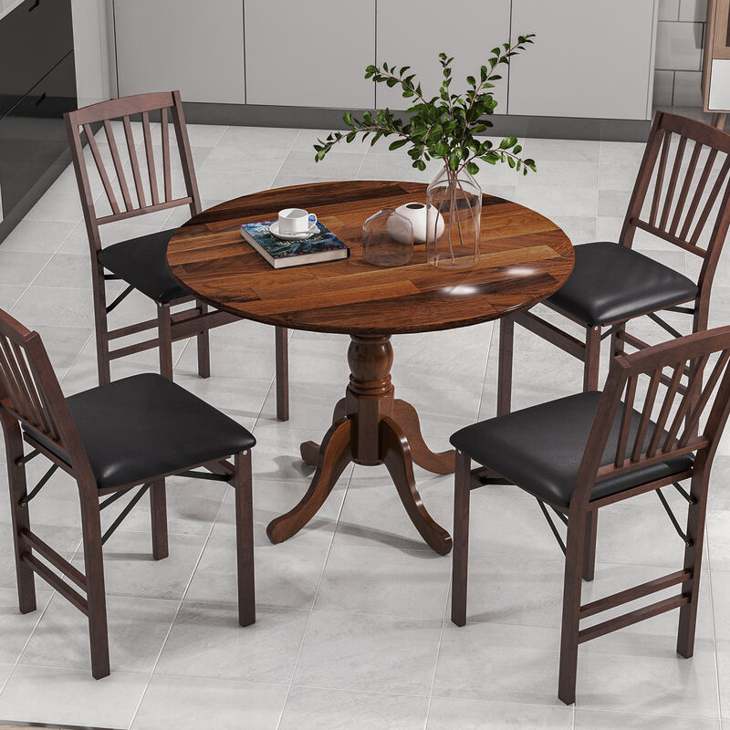 Wooden Dining Table with Round Tabletop and Curved Trestle Legs.