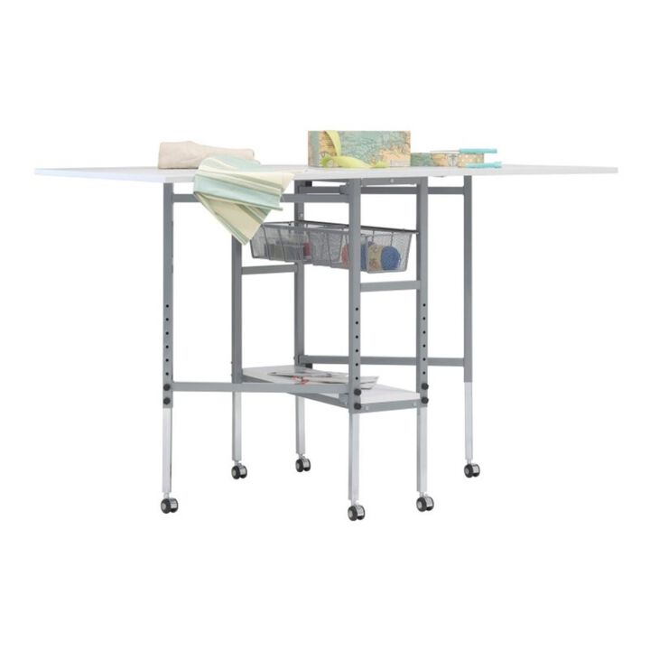 SD Studio Designs Sew Ready Mobile, Folding, Height Adjustable, Quilting, Fabric Cutting Table with Grid Top and Storage in Silver/White
