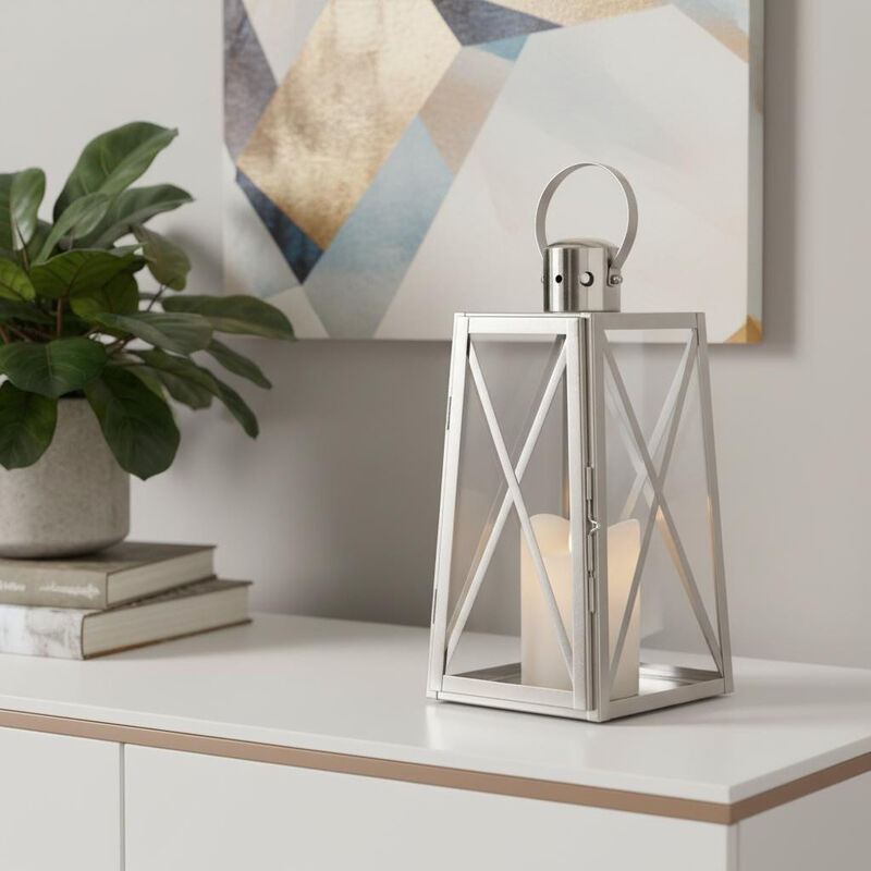 HomeRoots 12" Clear And Silver Glass And Stainless Steel Tabletop Lantern Candle Holder