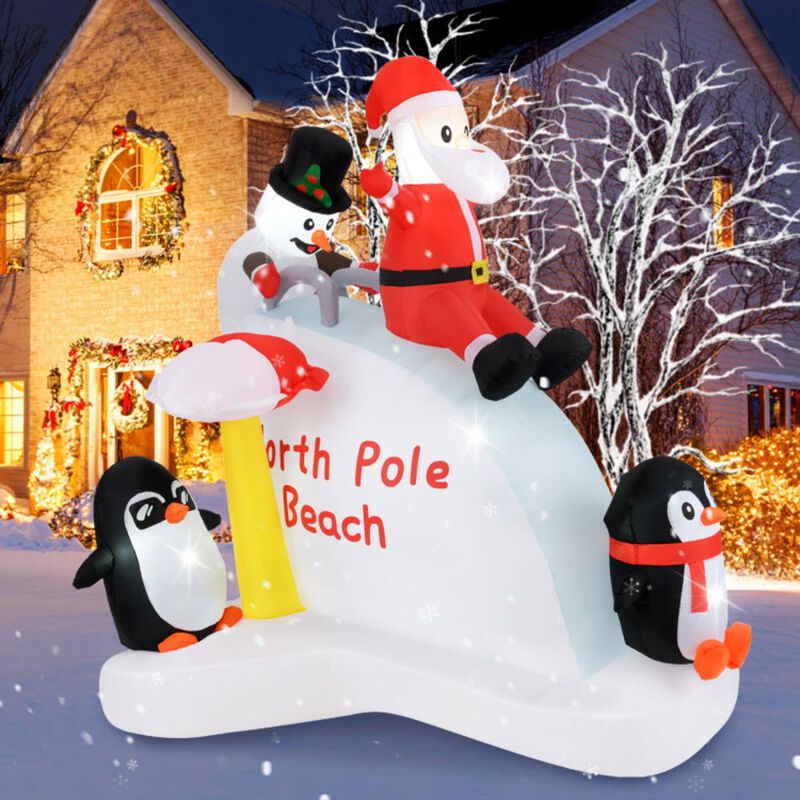Hivvago 6 Feet Christmas Inflatable with Blow up Penguins and Santa Decoration