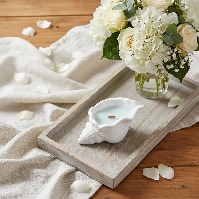 HomeRoots 6" Unscented Soy Wax Candle In White Resin Novelty Holder image number 1