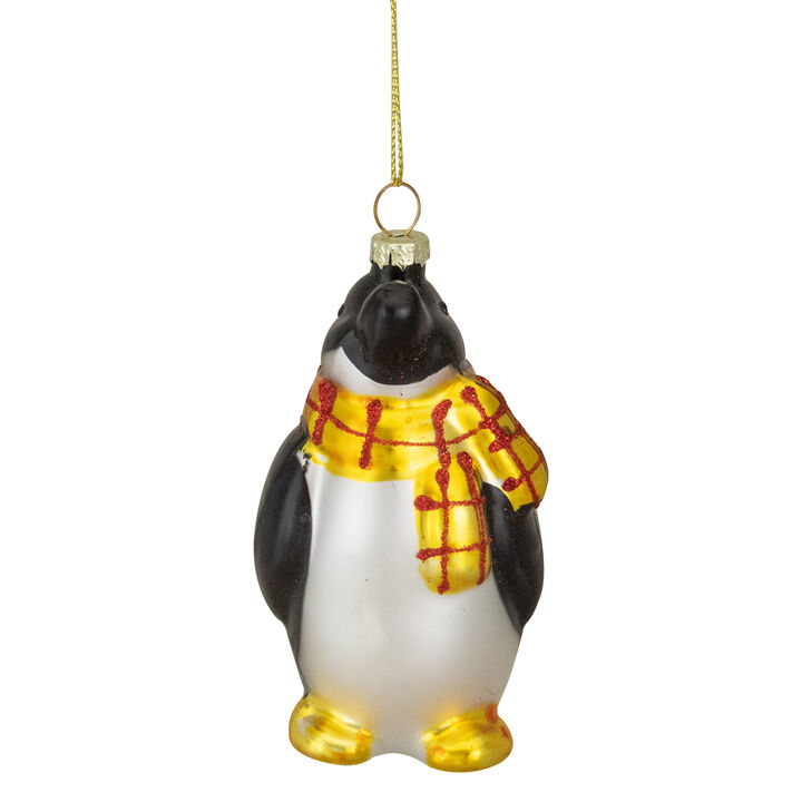 3.75" Black  White  and Yellow Glass Penguin Christmas Ornament