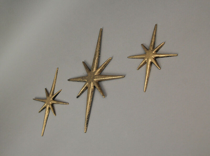 Set of 3 Metallic Gold Cast Iron Starburst Wall Hangings 8 Pointed Stars image number 1