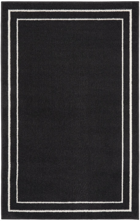 HomeRoots 2' X 4' Black And Ivory Indoor Outdoor Area Rug