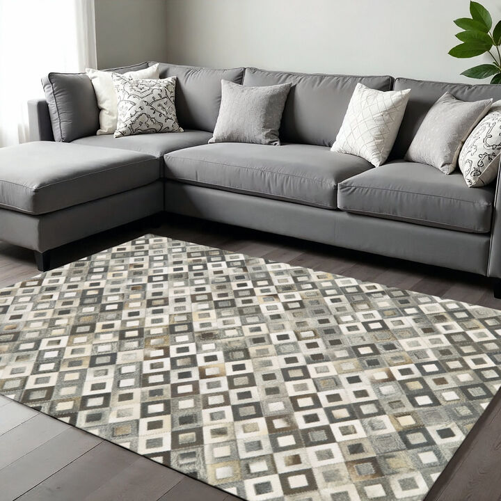 HomeRoots Faux Cowhide Geometric Area Rug