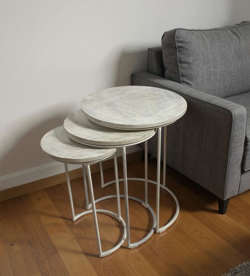 HomeRoots Set of Two White Solid Wood and Metal Round Frame Nested Tables image number 1