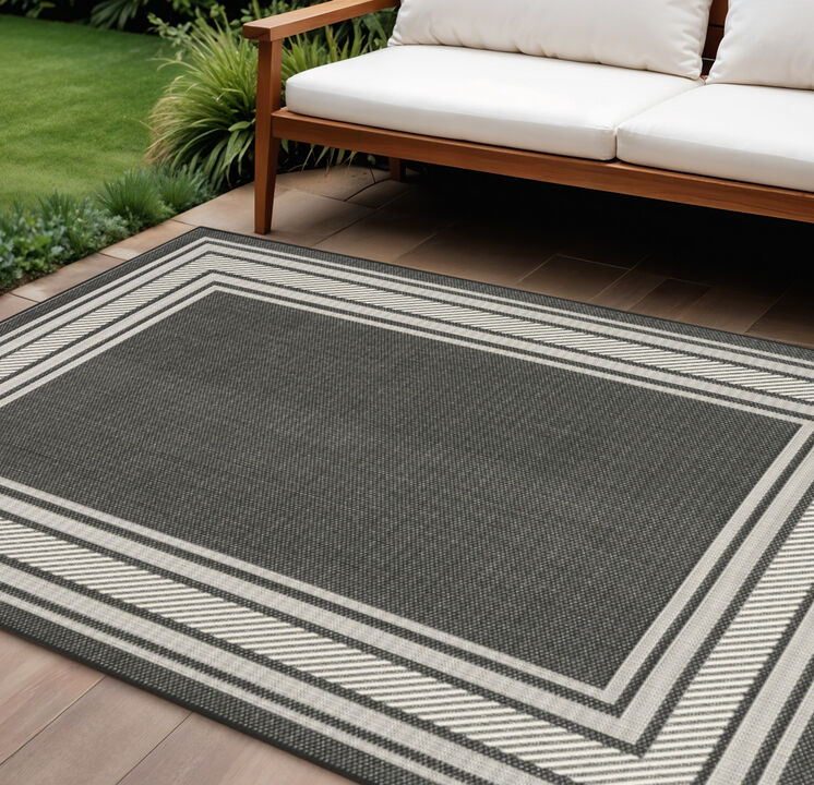 HomeRoots 6' X 9' Black Geometric Indoor Outdoor Area Rug