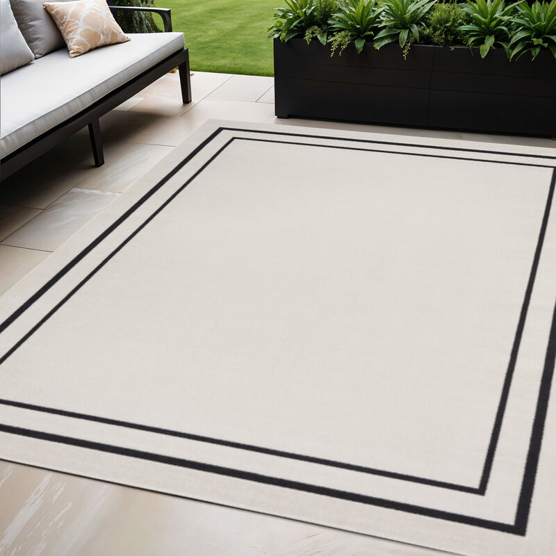 HomeRoots 5' X 7' Ivory And Black Indoor Outdoor Area Rug image number 1