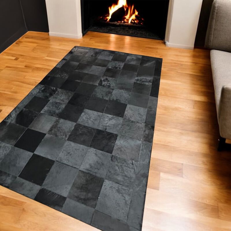 Black Square Checkered Cowhide Patchwork Rug image number 1