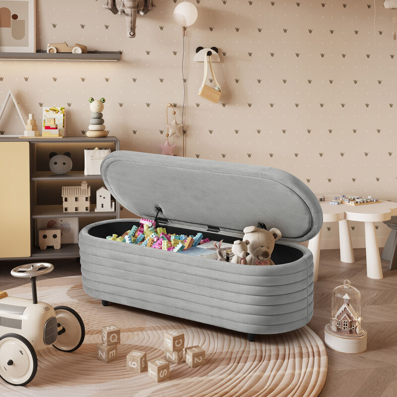 WestinTrends 54" Wide Mid-Century Modern Upholstered Velvet Tufted Oval Storage Ottoman Bench