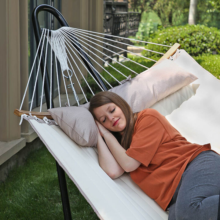 Quilted Hammock with Curved Wicker Spreaders for Comfortable Outdoor Relaxation
