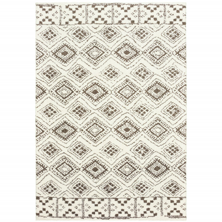 5 X 8 Ivory And Brown geometric Shag Power Loom Stain Resistant Area Rug