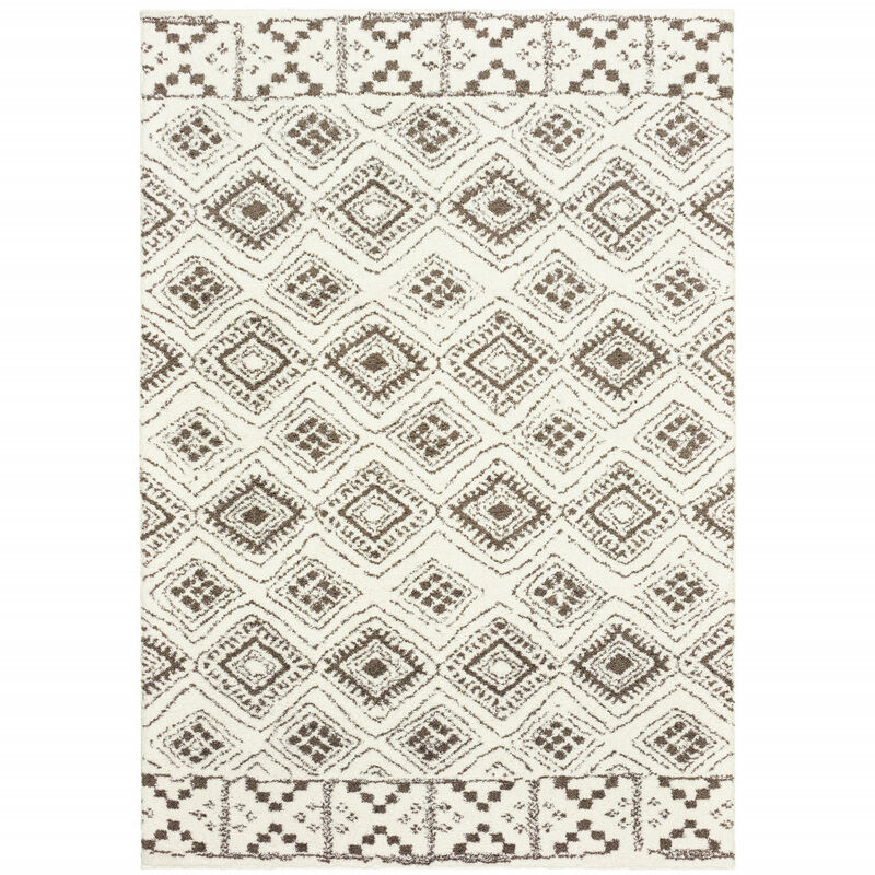 5 X 8 Ivory And Brown geometric Shag Power Loom Stain Resistant Area Rug