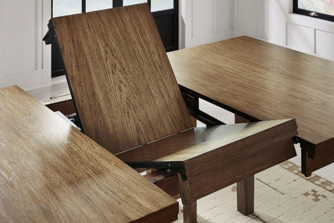Broxtyn Counter Height 60"-78" Extendable Dining Table