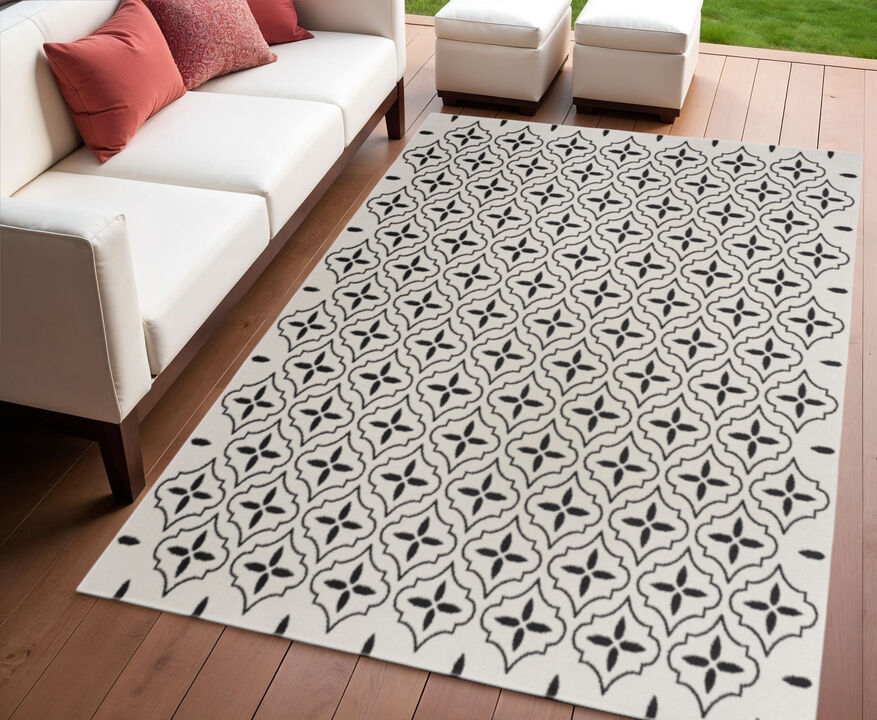 HomeRoots 4' X 6' Ivory And Black Geometric Indoor Outdoor Area Rug