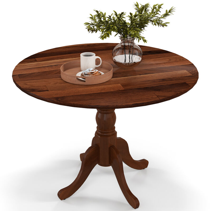 Wooden Dining Table with Round Tabletop and Curved Trestle Legs.