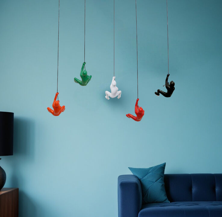 HomeRoots Set of Five Black Green Orange Red And White Resin Climbing Man Hanging Dimensional Sculpture