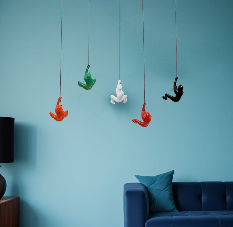 HomeRoots Set of Five Black Green Orange Red And White Resin Climbing Man Hanging Dimensional Sculpture image number 1