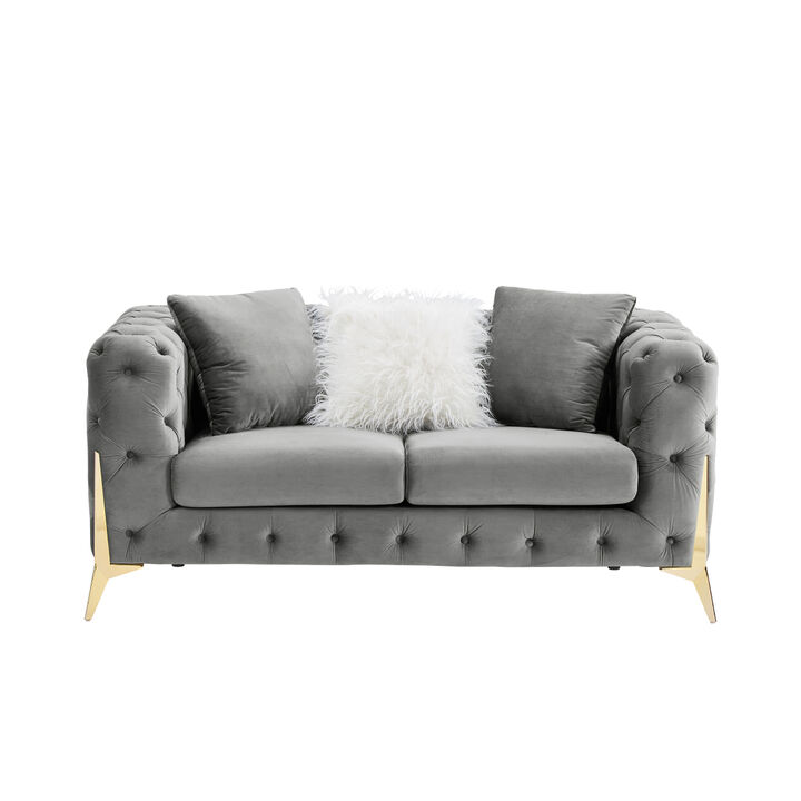 Two-seater gray velvet sofa