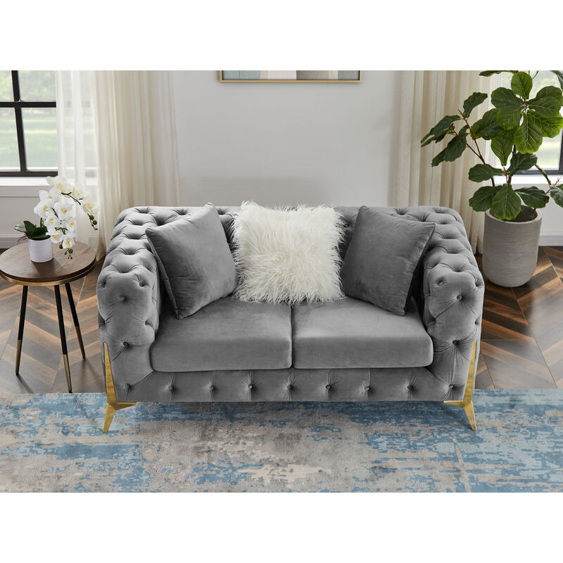 Two-seater gray velvet sofa