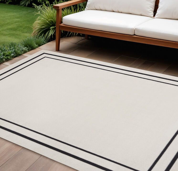 HomeRoots 9' X 12' Ivory And Black Indoor Outdoor Area Rug
