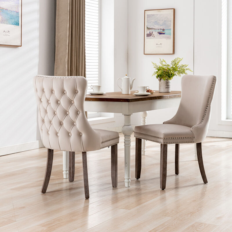 Streamdale 2 Beige Wingback Dining Chairs with Nailhead Trim & Wood Legs