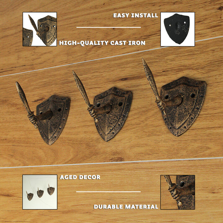 Zeckos Cast Iron Fun Wall Hooks - Set of 3, Bronze Sword & Shield Decorative Hooks for Entryway Wall, Perfect for Swordsman, Cosplay Enthusiast, 3.5x3x4 inches, Antique Bronze Finish