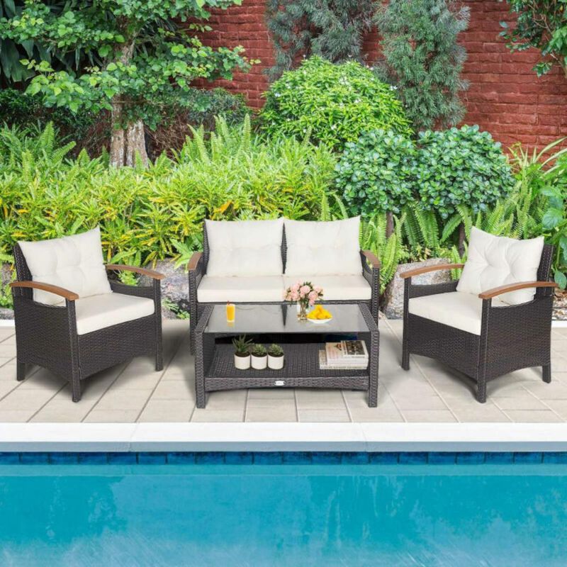 Hivvago 4 Pieces Patio Rattan Furniture Set with Cushioned Sofa and Storage Table