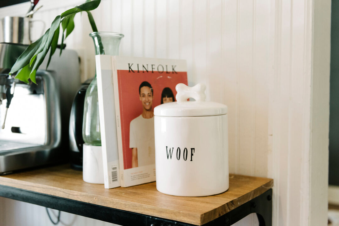 Ceramic Dog Treat Jar with "Woof" Message and Bone Handle Lid, White and Black