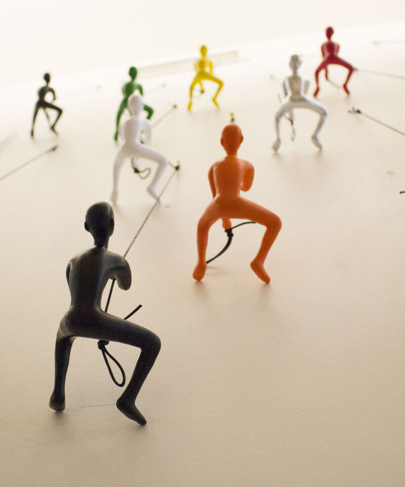 HomeRoots Set of Five Black Green Orange Red And White Resin Climbing Man Hanging Dimensional Sculpture image number 3